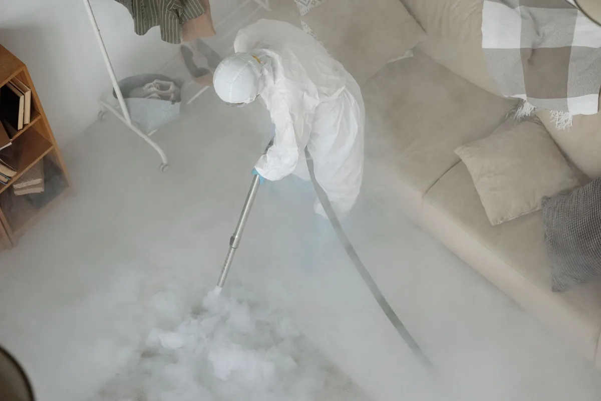 Biohazard cleanup technician in protective equipment, Woonsocket, RI